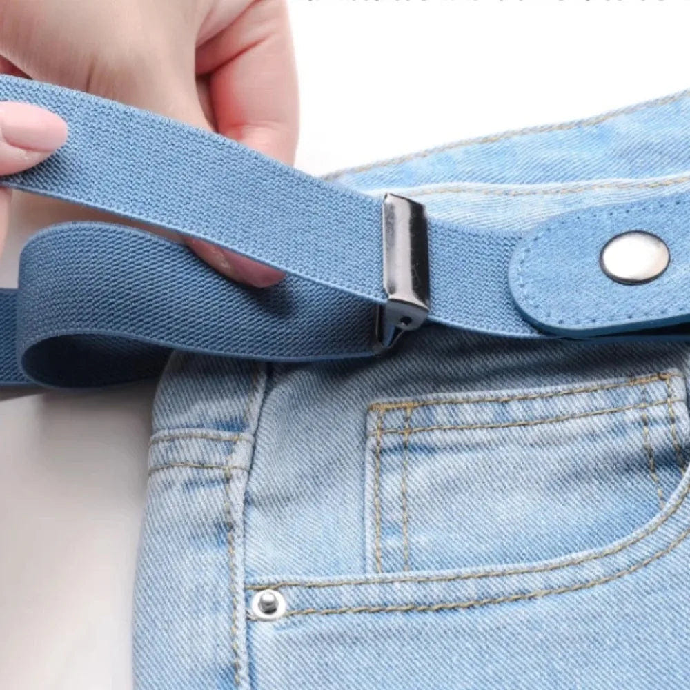 Close-up of the light blue belt band passing through its sliding adjuster