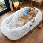 Human-size dog bed with owner and dog lounging together