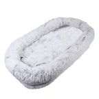 Human-size dog bed, grey faux fur, angled product view