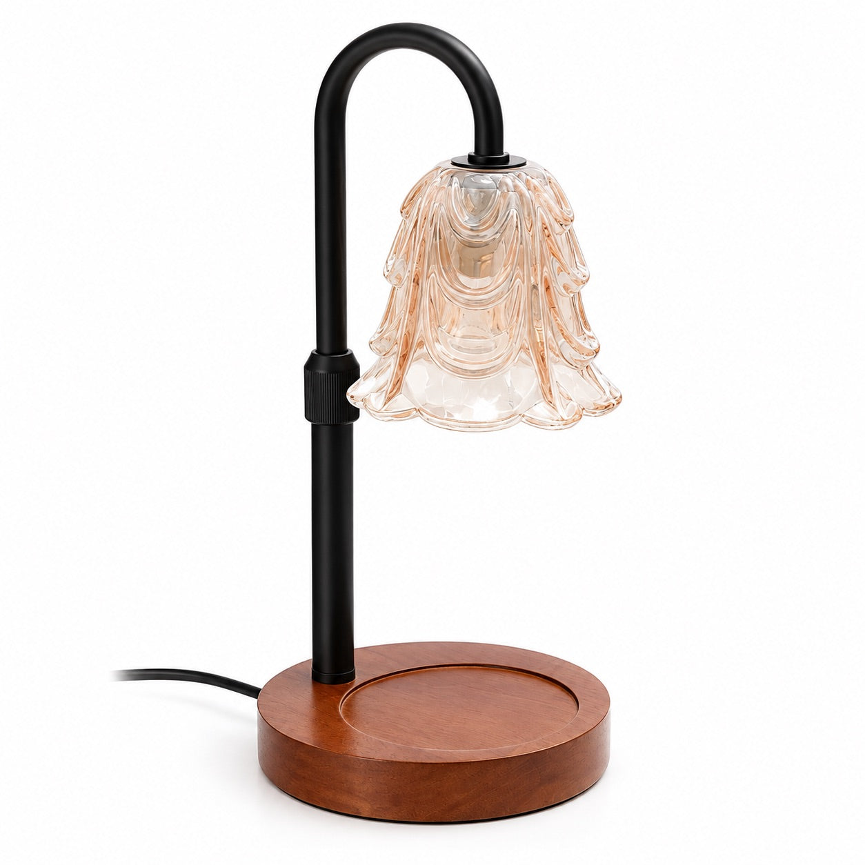 Flower candle warmer lamp with a scalloped glass shade and wooden base on a white background
